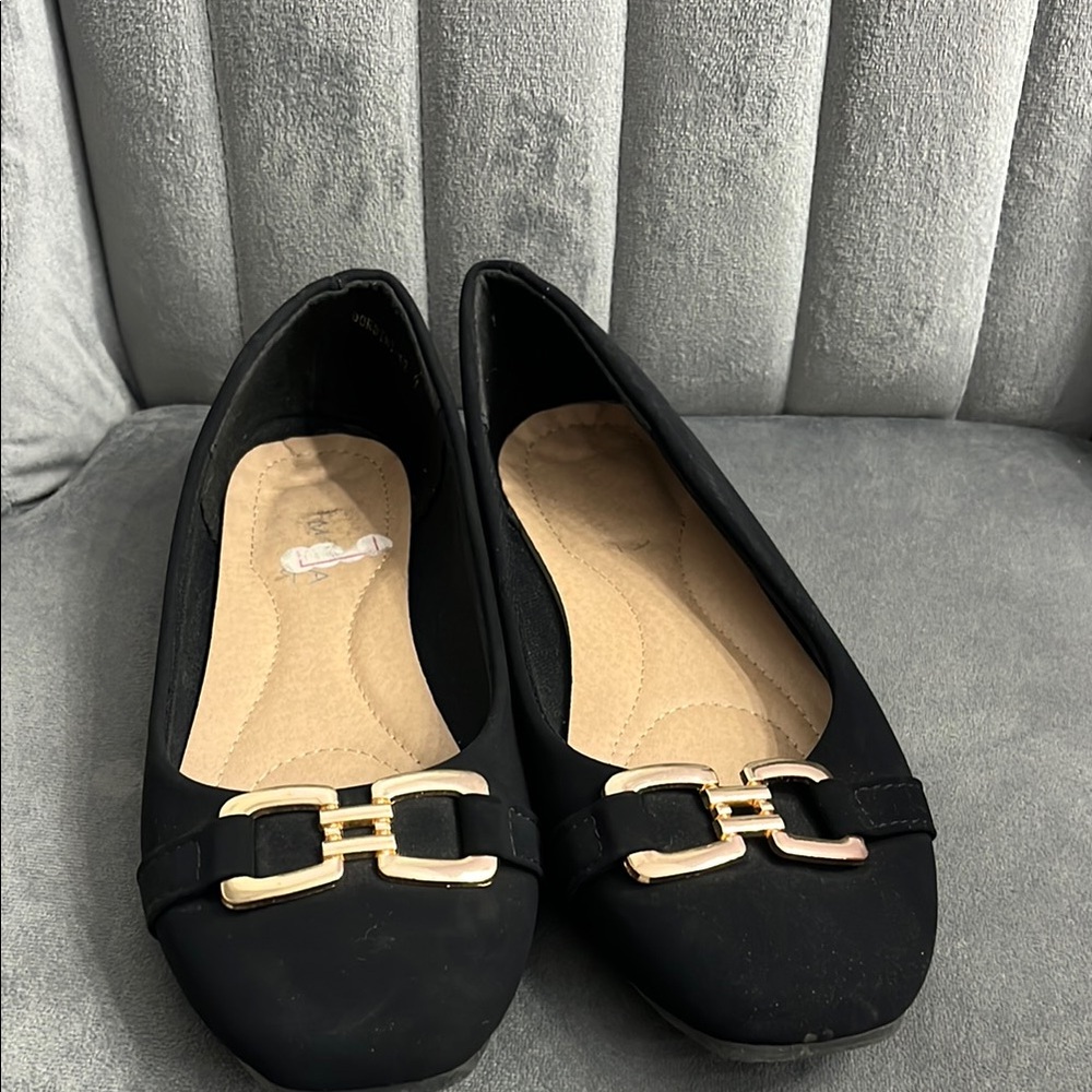 Elegant Black Flats with Gold Accents